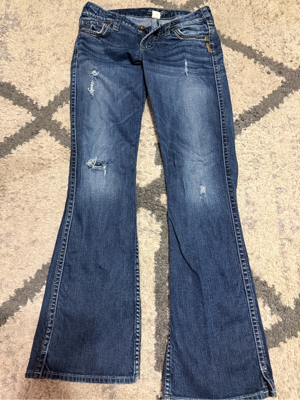 Silver Jeans Distressed Dark Blue Flare Jeans